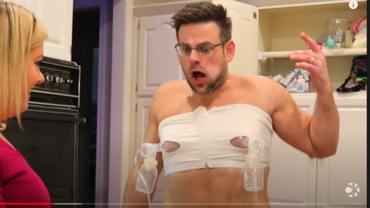 man screaming in pain while wearing breast pump